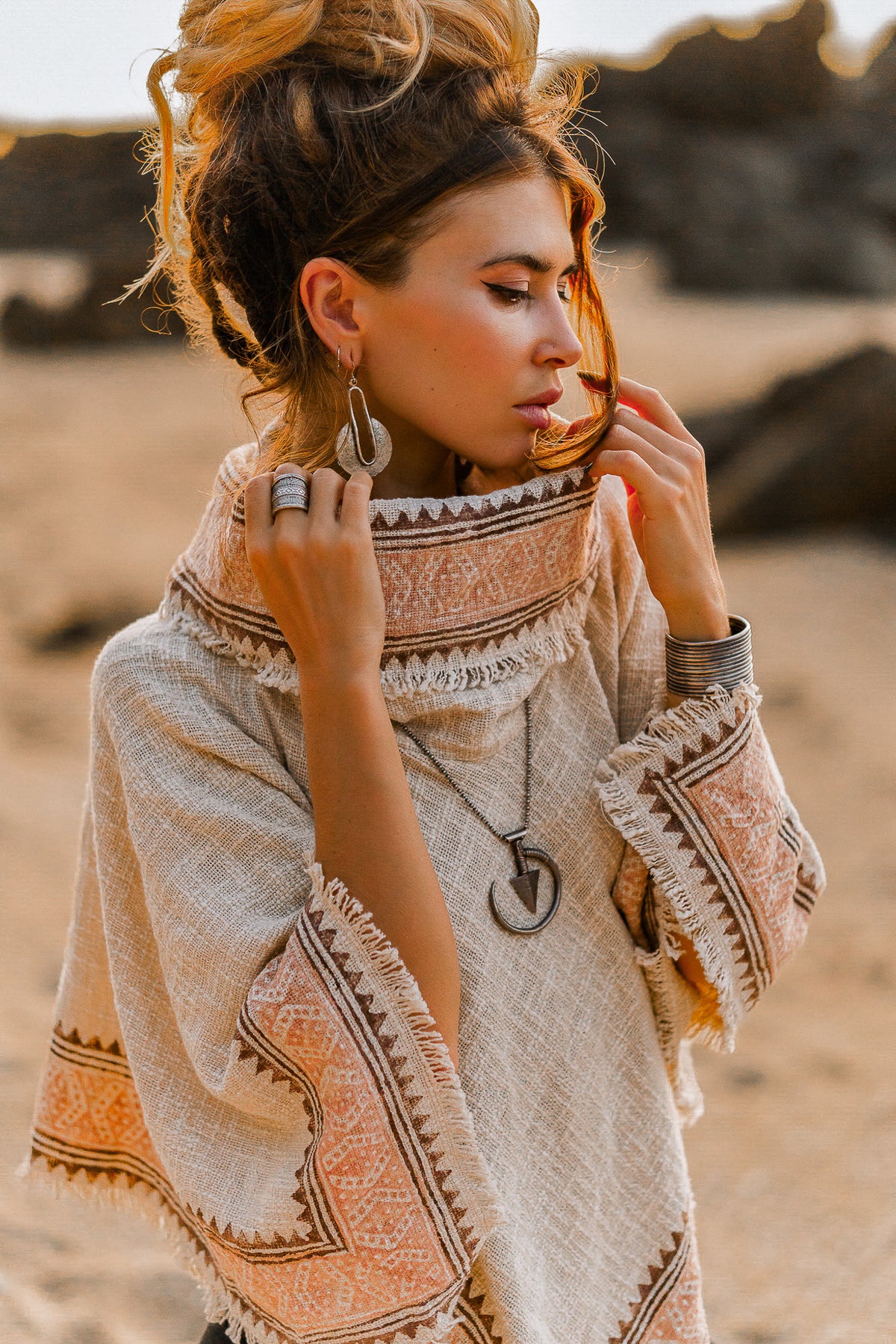 Poncho grande encolure
