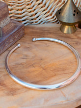 Thin torque necklace