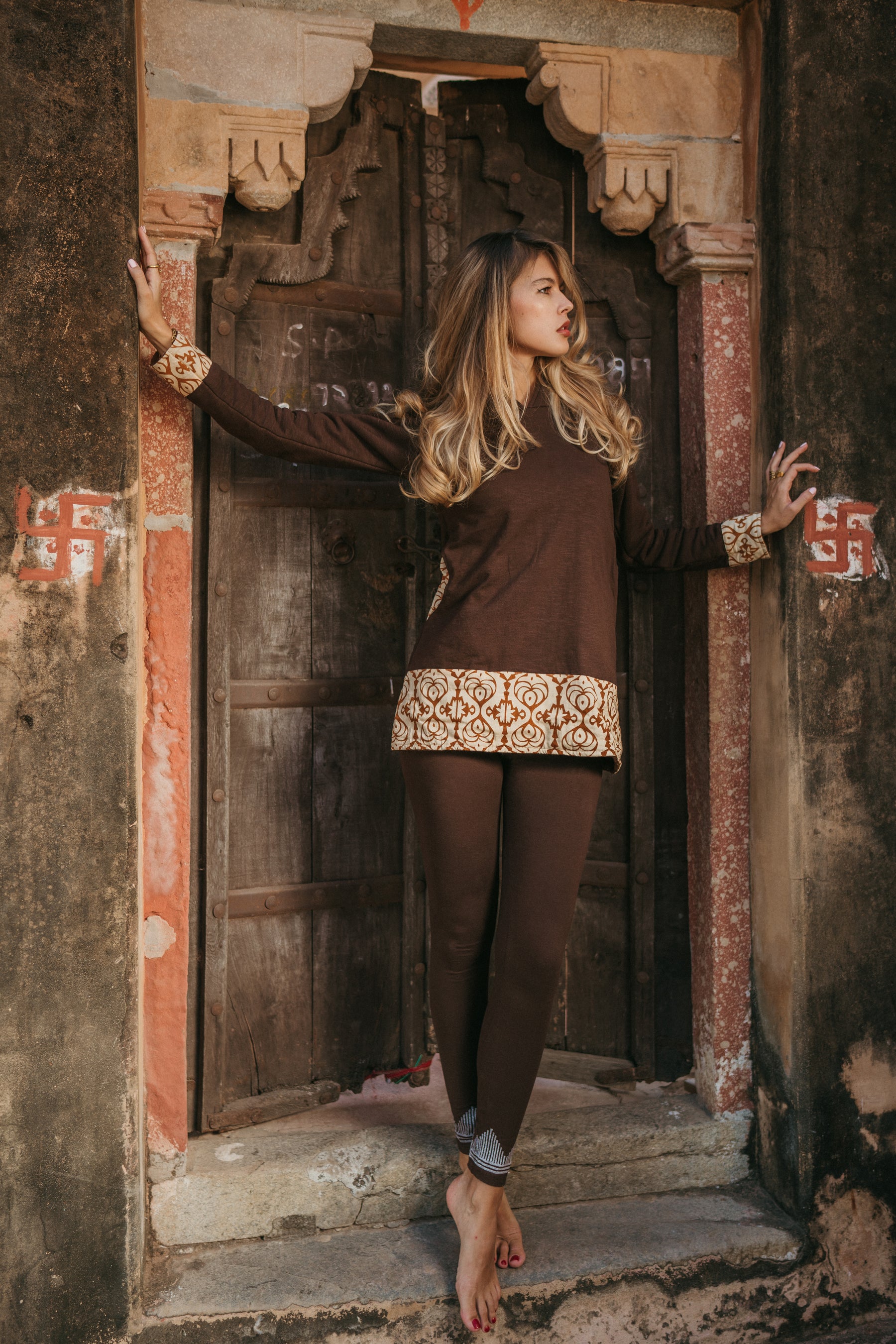 Wide trousers with tribal belt