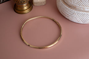 Collier torque fermé