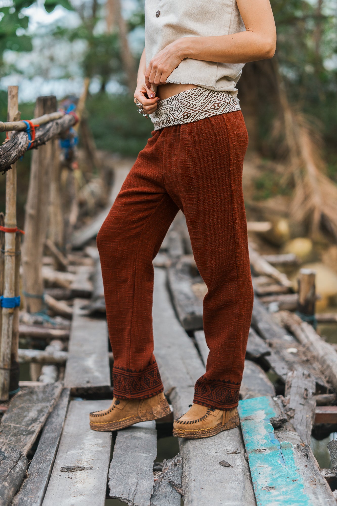 Wide trousers with tribal belt